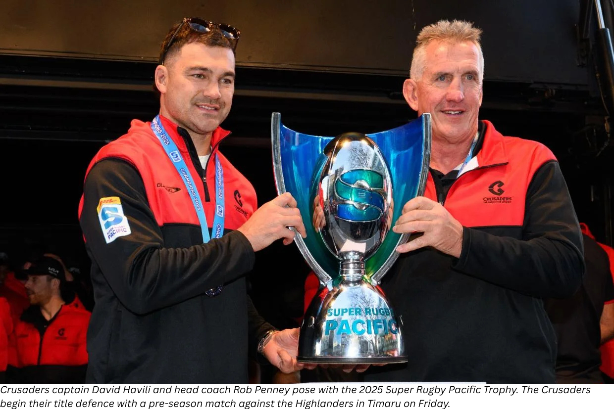 Crusaders captain David Havili and head coach Rob Penney pose with the 2025 Super Rugby Pacific Trophy. The Crusaders begin their title defence with a pre-season match against the Highlanders in Timaru on Friday.